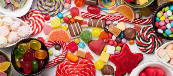 Colorful sweets. Lollipops and candies. Top view closeup